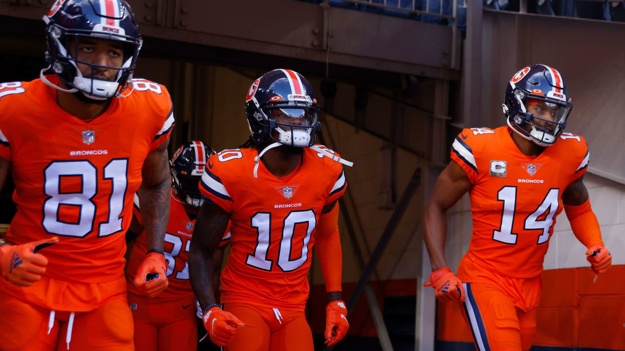 DENVER, COLORADO - NOVEMBER 14: Tim Patrick #81 of the Denver Broncos, Jerry Jeudy #10 and Courtland Sutton #14 take to the field before a game against the Philadelphia Eagles at Empower Field At Mile High on November 14, 2021 in Denver, Colorado.