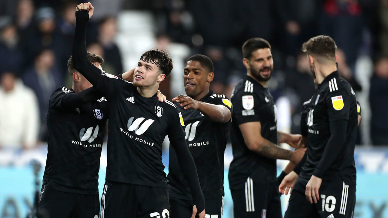 Fulham's Neco Williams (second left) celebrates scoring their side's fourth goal of the game with team-mates during the Sky Bet Championship match at the Swansea.com Stadium, Swansea. Picture date: Tuesday March 8, 2022.