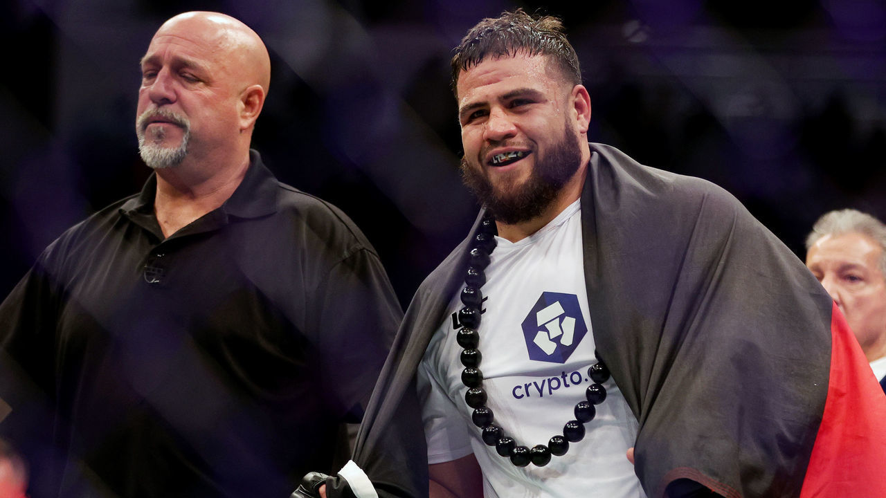 HOUSTON, TEXAS - FEBRUARY 12: Tai Tuivasa of Australia celebrates after winning his heavyweight fight against Derrick Lewis via a second-round knockout during UFC 271 at Toyota Center on February 12, 2022 in Houston, Texas.