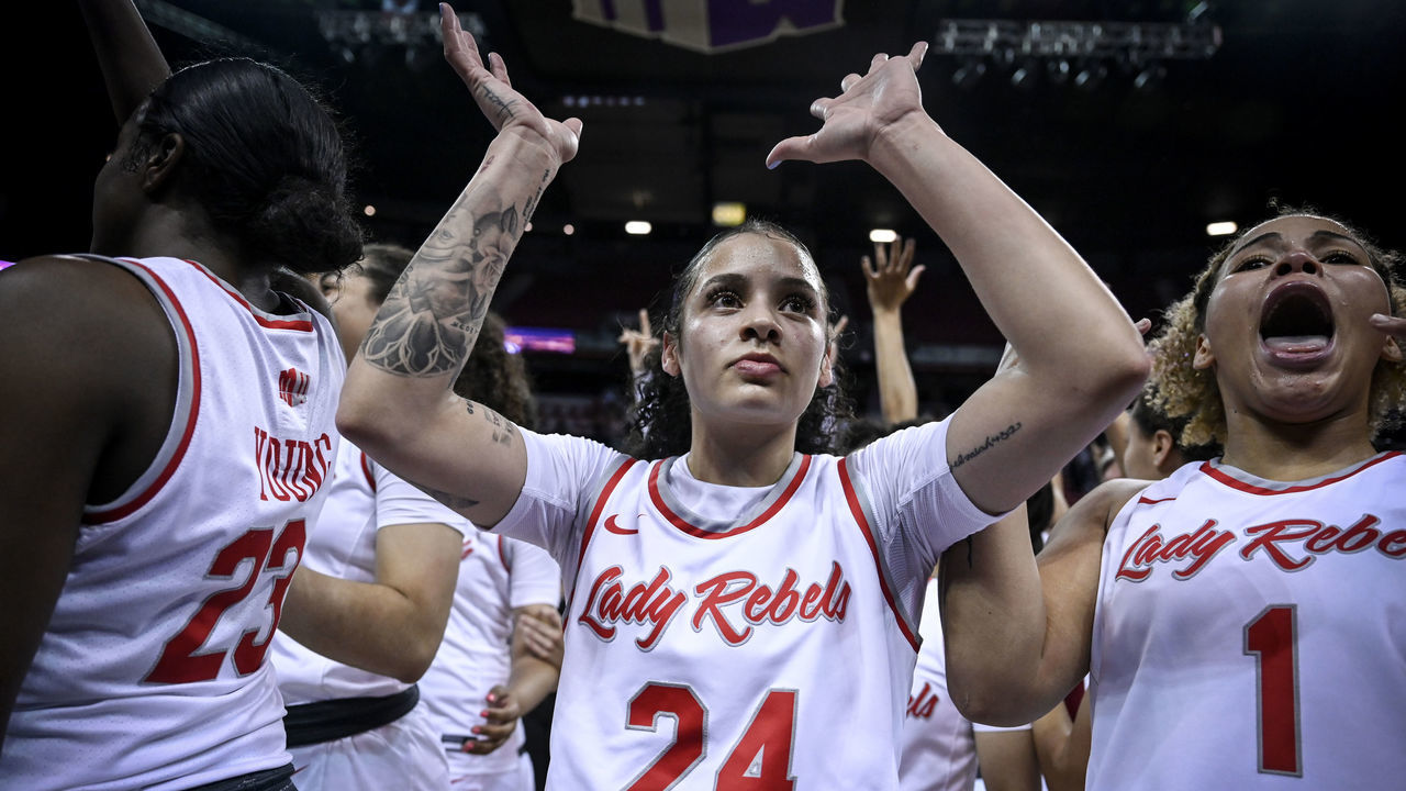 LAS VEGAS, NV - MARCH 9: Essence Booker (24) of the UNLV Lady Rebels waves to fans after the second half of UNLV"u2019s 75-65 Mountain West Conference tournament championship game win over the Colorado State Rams at Thomas & Mack Center in Las Vegas, Nevada on Wednesday, March 9, 2022.