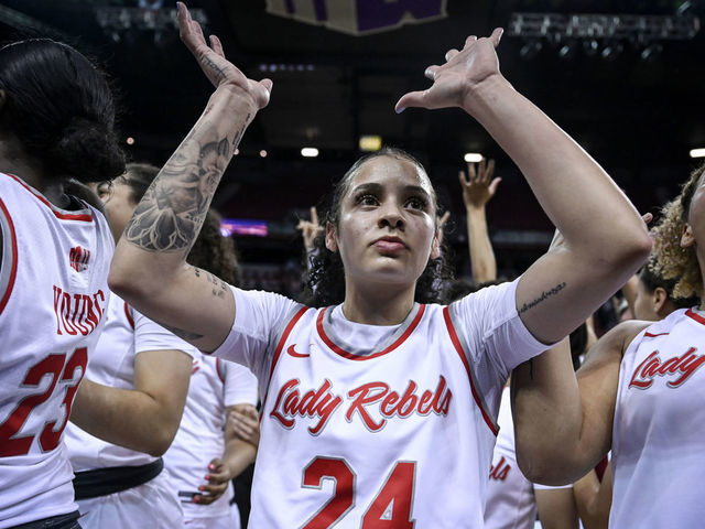LAS VEGAS, NV - MARCH 9: Essence Booker (24) of the UNLV Lady Rebels waves to fans after the second half of UNLV"u2019s 75-65 Mountain West Conference tournament championship game win over the Colorado State Rams at Thomas & Mack Center in Las Vegas, Nevada on Wednesday, March 9, 2022.