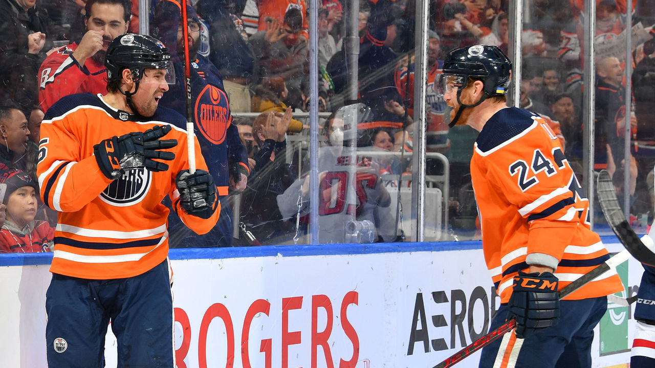 EDMONTON, AB - MARCH 9: Cody Ceci #5 and Brad Malone #24 of the Edmonton Oilers celebrate after a goal during the game against the Washington Capitals on March 9, 2022 at Rogers Place in Edmonton, Alberta, Canada.