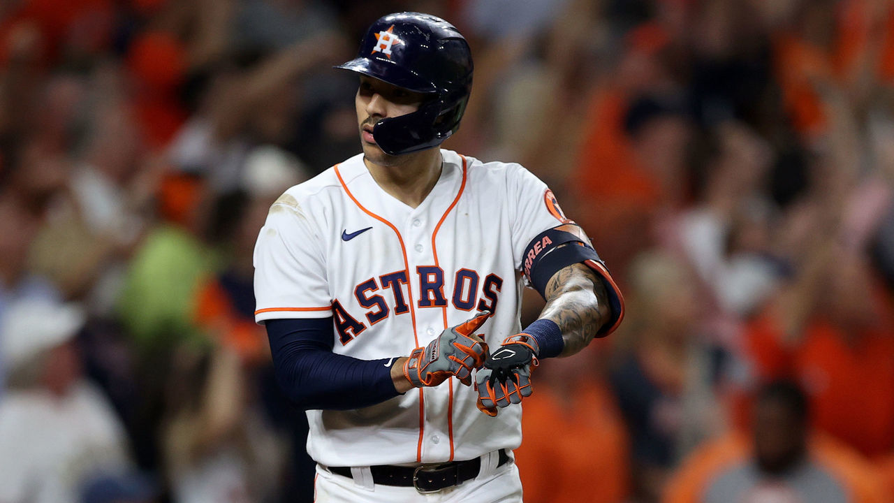 HOUSTON, TEXAS - OCTOBER 15: Carlos Correa #1 of the Houston Astros points to his watch after he hit a home run in the seventh inning against the Boston Red Sox during Game One of the American League Championship Series at Minute Maid Park on October 15, 2021 in Houston, Texas.