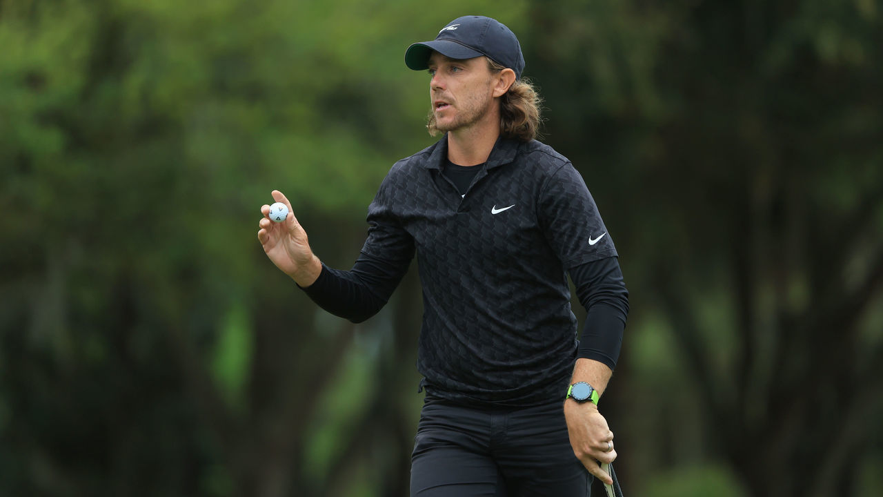 PONTE VEDRA BEACH, FLORIDA - MARCH 10: Tommy Fleetwood of England waves after putting on the third green during the first round of THE PLAYERS Championship on the Stadium Course at TPC Sawgrass on March 10, 2022 in Ponte Vedra Beach, Florida.