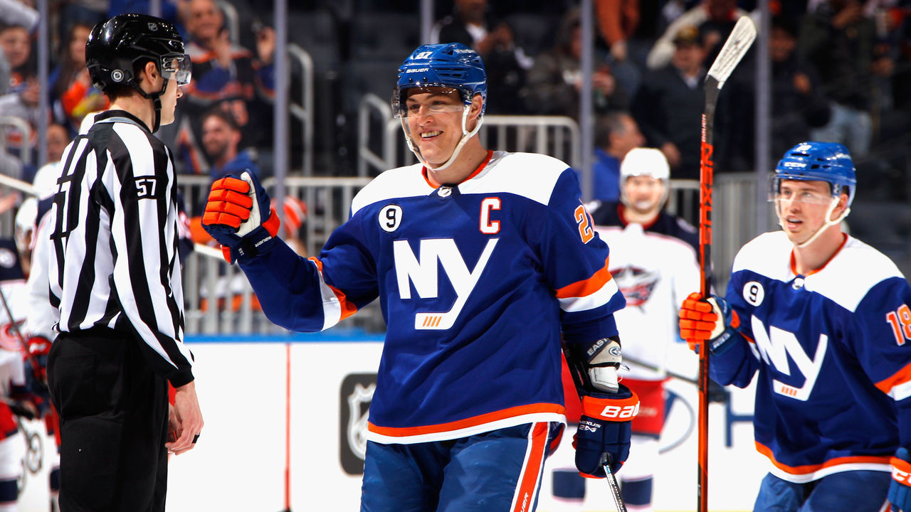 ELMONT, NEW YORK - MARCH 10: Anders Lee #27 of the New York Islanders celebrates his hattrick goal at 19:58 of the third period against the Columbus Blue Jackets at the UBS Arena on March 10, 2022 in Elmont, New York.