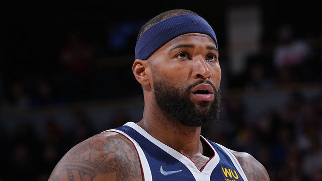 DENVER, CO - MARCH 10: DeMarcus Cousins #4 of the Denver Nuggets looks on during the game against the Golden State Warriors on March 10, 2022 at the Ball Arena in Denver, Colorado. NOTE TO USER: User expressly acknowledges and agrees that, by downloading and/or using this Photograph, user is consenting to the terms and conditions of the Getty Images License Agreement. Mandatory Copyright Notice: Copyright 2022 NBAE