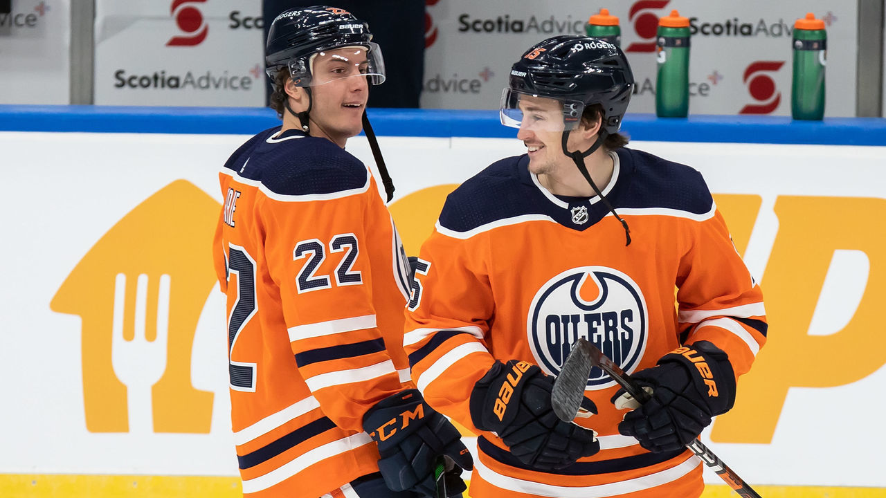 EDMONTON, AB - JANUARY 16: Tyson Barrie #22 and Josh Archibald #15 of the Edmonton Oilers skate against the Montreal Canadiens at Rogers Place on January 16, 2021 in Edmonton, Canada.