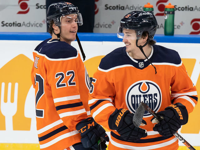 EDMONTON, AB - JANUARY 16: Tyson Barrie #22 and Josh Archibald #15 of the Edmonton Oilers skate against the Montreal Canadiens at Rogers Place on January 16, 2021 in Edmonton, Canada.