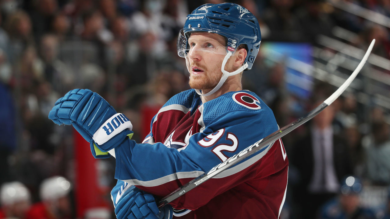 DENVER, COLORADO - MARCH 05: Gabriel Landeskog #92 of the Colorado Avalanche looks on during a break in the action against the Calgary Flames at Ball Arena on March 05, 2022 in Denver, Colorado.