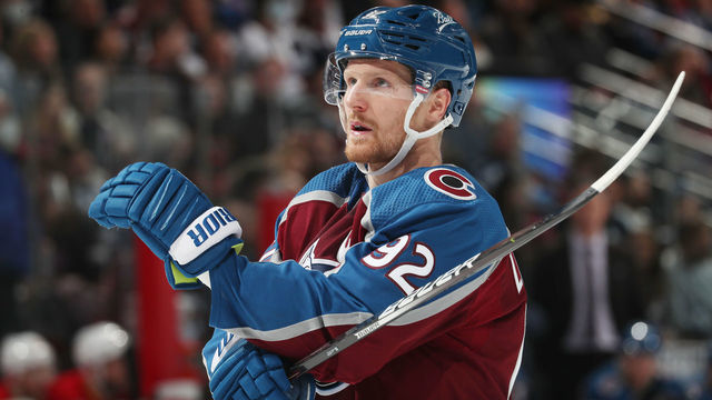 DENVER, COLORADO - MARCH 05: Gabriel Landeskog #92 of the Colorado Avalanche looks on during a break in the action against the Calgary Flames at Ball Arena on March 05, 2022 in Denver, Colorado.