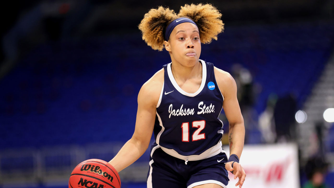 SAN ANTONIO, TEXAS - MARCH 21: Jariyah Covington #12 of the Jackson State Lady Tigers controls the ball during the first half against the Baylor Lady Bears in the first round game of the 2021 NCAA Women's Basketball Tournament at the Alamodome on March 21, 2021 in San Antonio, Texas.