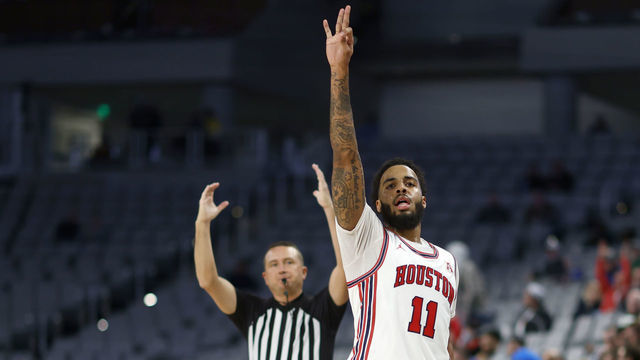 FORT WORTH, TX - MARCH 12: Kyler Edwards #11 of the Houston Cougars celebrates after hitting a three point basket against the Tulane Green Wave in the second half of the American Athletic Conference Mens Basketball Tournament Semifinals at Dickies Arena on March 12, 2022 in Fort Worth, Texas. Houston defeated Tulane 86-66.