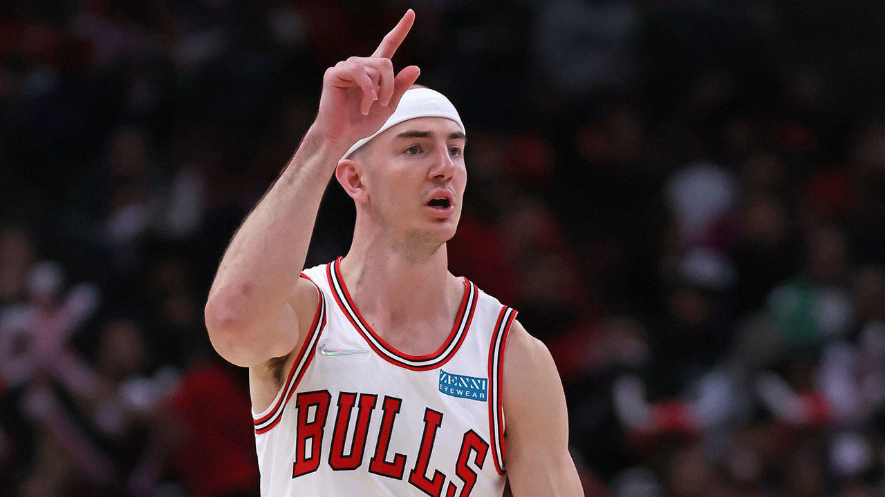 CHICAGO, ILLINOIS - MARCH 12: Alex Caruso #6 of the Chicago Bulls directs players as he brings the ball up the court against the Cleveland Cavaliers at the United Center on March 12, 2022 in Chicago, Illinois. The Bulls defeated the Cavaliers 101-91.