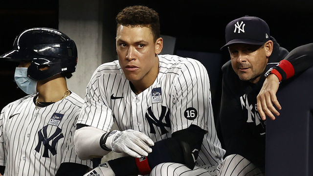 NEW YORK, NY - JUNE 2: Aaron Judge #99 of the New York Yankees and Aaron Boone #17 of the New York Yankees looks on against the Tampa Bay Rays during the sixth inning at Yankee Stadium on June 2, 2021 in the Bronx borough of New York City.