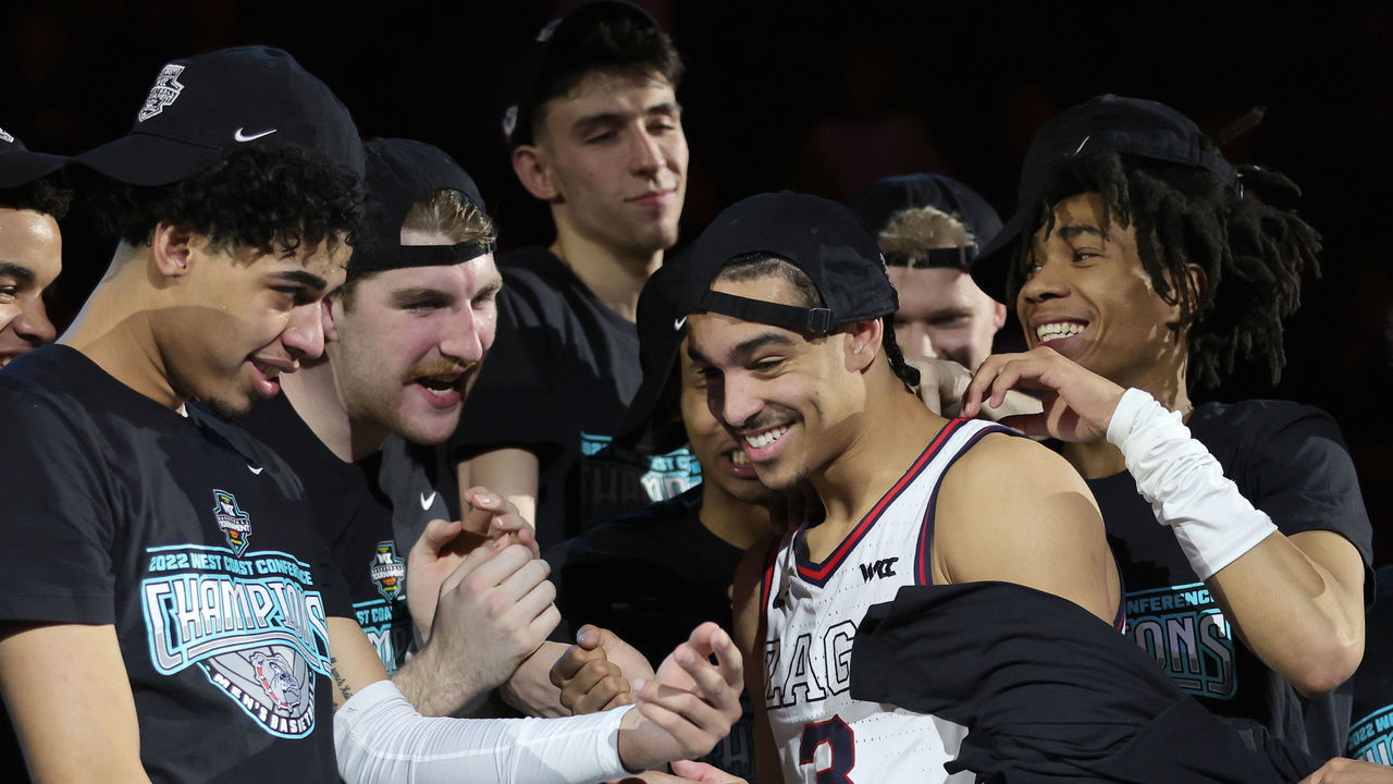 LAS VEGAS, NEVADA - MARCH 08: Andrew Nembhard #3 of the Gonzaga Bulldogs is congratulated after being named the recipient of the most outstanding player award by teammates (L-R) Julian Strawther #0, Drew Timme #2, Chet Holmgren #34 and Hunter Sallis #10 following the team's 82-69 victory over the Saint Mary's Gaels to win the championship game of the West Coast Conference basketball tournament at the Orleans Arena on March 08, 2022 in Las Vegas, Nevada.
