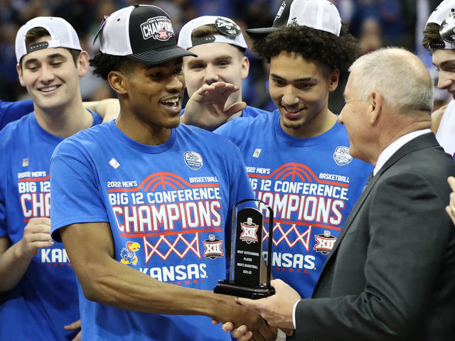 KANSAS CITY, MO - MARCH 12: Kansas Jayhawks guard Ochai Agbaji (30) accepts the Outstanding Player award after the Big 12 Tournament championship game between the Texas Tech Red Raiders and Kansas Jayhawks on Mar 12, 2022 at T-Mobile Arena in Kansas City, MO.