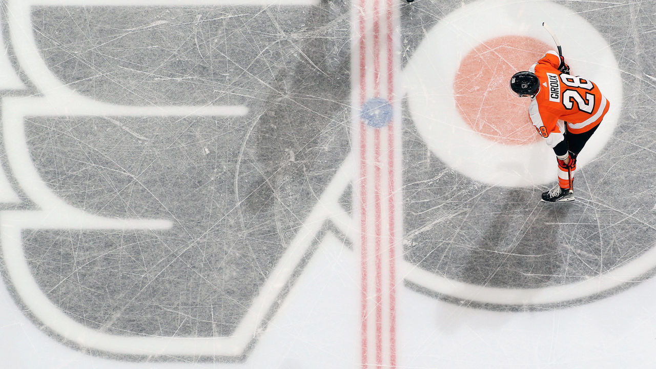 PHILADELPHIA, PA - MARCH 13: Claude Giroux #28 of the Philadelphia Flyers looks on during a stoppage in play against the Montreal Canadiens at the Wells Fargo Center on March 13, 2022 in Philadelphia, Pennsylvania. The Canadiens went on to defeat the Flyers 4-3 in overtime.