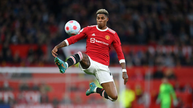 MANCHESTER, ENGLAND - MARCH 12: Marcus Rashford of Manchester United controls the ball in the air during the Premier League match between Manchester United and Tottenham Hotspur at Old Trafford on March 12, 2022 in Manchester, England.