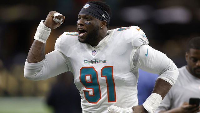 NEW ORLEANS, LOUISIANA - DECEMBER 27: Emmanuel Ogbah #91 of the Miami Dolphins reacts after defeating the at Caesars Superdome on December 27, 2021 in New Orleans, Louisiana.