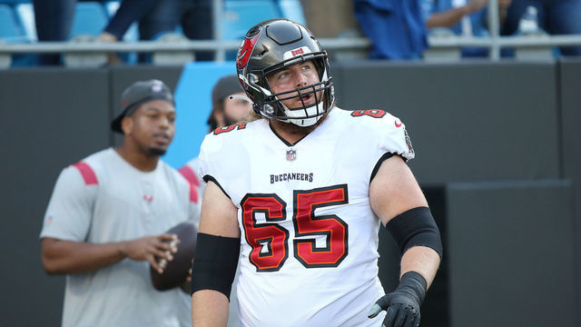 CHARLOTTE, NC - DECEMBER 26: Tampa Bay Buccaneers Offensive Guard Alex Cappa (65) during an NFL football game between the Tampa Bay Buccaneers and the Carolina Panthers on December 26, 2021, at Bank of America Stadium in Charlotte, N.C.