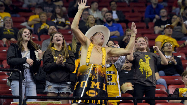 LAS VEGAS, NEVADA - MARCH 11: Wyoming Cowboys fan Ken "Cowboy Ken Barrel Man" Koretos of Wyoming cheers during a semifinal game of the Mountain West Conference basketball tournament against the Boise State Broncos at the Thomas & Mack Center on March 11, 2022 in Las Vegas, Nevada. Boise State won 68-61.