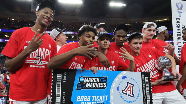 LAS VEGAS, NEVADA - MARCH 12: (L-R) Dalen Terry #4, Justin Kier #5, Kerr Kriisa #25, Bennedict Mathurin #0, Pelle Larsson #3 and Azuolas Tubelis #10 of the Arizona Wildcats pose with the championship trophy and a ceremonial NCAA tournament ticket with a team sticker on it after the team's 84-76 victory over the UCLA Bruins to win the Pac-12 Conference basketball tournament championship game at T-Mobile Arena on March 12, 2022 in Las Vegas, Nevada.