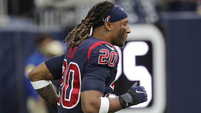 HOUSTON, TEXAS - DECEMBER 26: Justin Reid #20 of the Houston Texans is introduced to the crowd before playing the Los Angeles Charger at NRG Stadium on December 26, 2021 in Houston, Texas.
