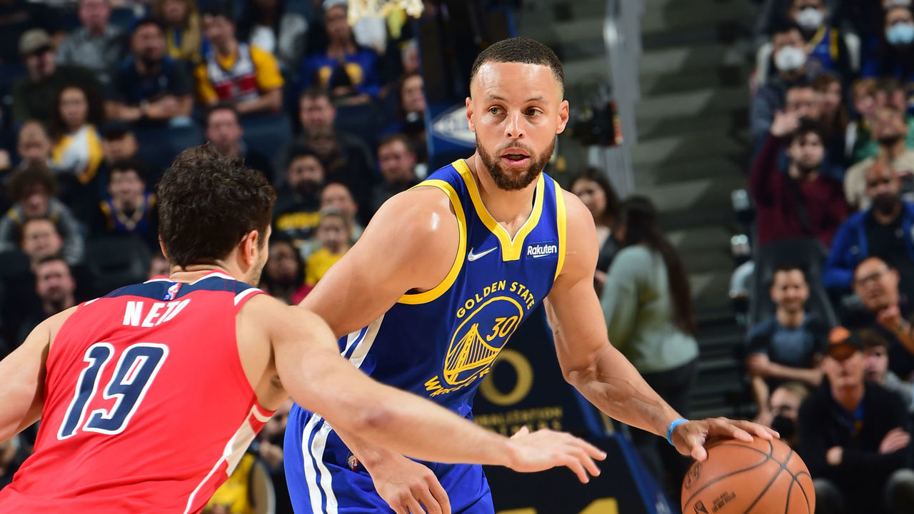 SAN FRANCISCO, CA - MARCH 14: Stephen Curry #30 of the Golden State Warriors dribbles the ball during the game against the Washington Wizards on March 14, 2022 at Chase Center in San Francisco, California. NOTE TO USER: User expressly acknowledges and agrees that, by downloading and or using this photograph, user is consenting to the terms and conditions of Getty Images License Agreement. Mandatory Copyright Notice: Copyright 2022 NBAE