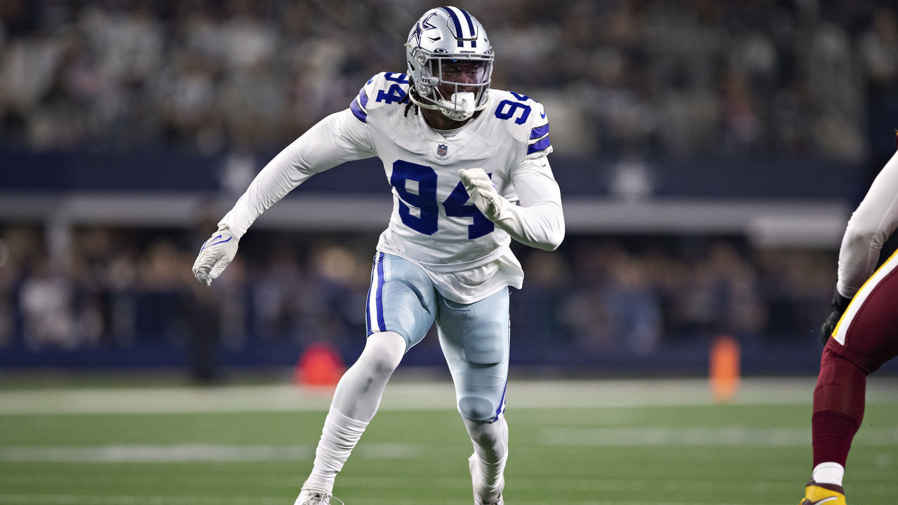 ARLINGTON, TEXAS - DECEMBER 26: Randy Gregory #94 of the Dallas Cowboys rushes the quarterback during a game against the Washington Football Team at AT&T Stadium on December 26, 2021 in Arlington, Texas. The Cowboys defeated the Football Team 56-14.