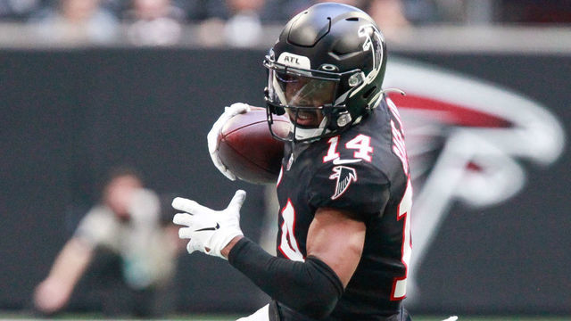 ATLANTA, GA - DECEMBER 26: Russell Gage #14 of the Atlanta Falcons tries to stay in bounds after a catch in the second half against the Detroit Lions at Mercedes-Benz Stadium on December 26, 2021 in Atlanta, Georgia.