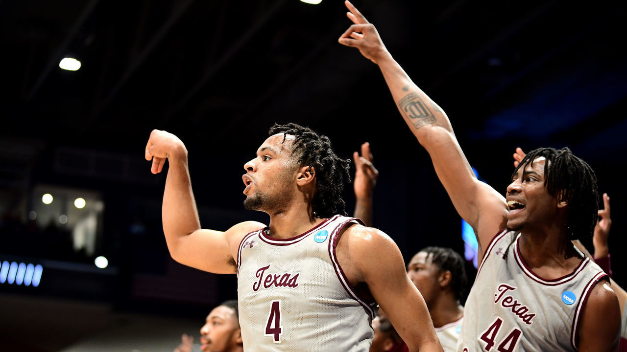 DAYTON, OHIO - MARCH 15: Bryson Etienne #4 of the Texas Southern Tigers shoots a three pointer against the Texas A&M-CC Islanders during the second half in the First Four game of the 2022 NCAA Men's Basketball Tournament at UD Arena on March 15, 2022 in Dayton, Ohio.