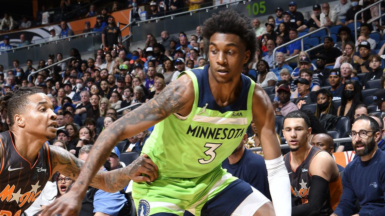 ORLANDO, FL - MARCH 11: Jaden McDaniels #3 of the Minnesota Timberwolves drives to the basket during the game against the Orlando Magic on March 11, 2022 at Amway Center in Orlando, Florida. Mandatory Copyright Notice: Copyright 2022 NBAE