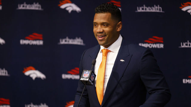 ENGLEWOOD, CO - MARCH 16: Quarterback Russell Wilson #3 of the Denver Broncos addresses the press at UCHealth Training Center on March 16, 2022 in Englewood, Colorado.