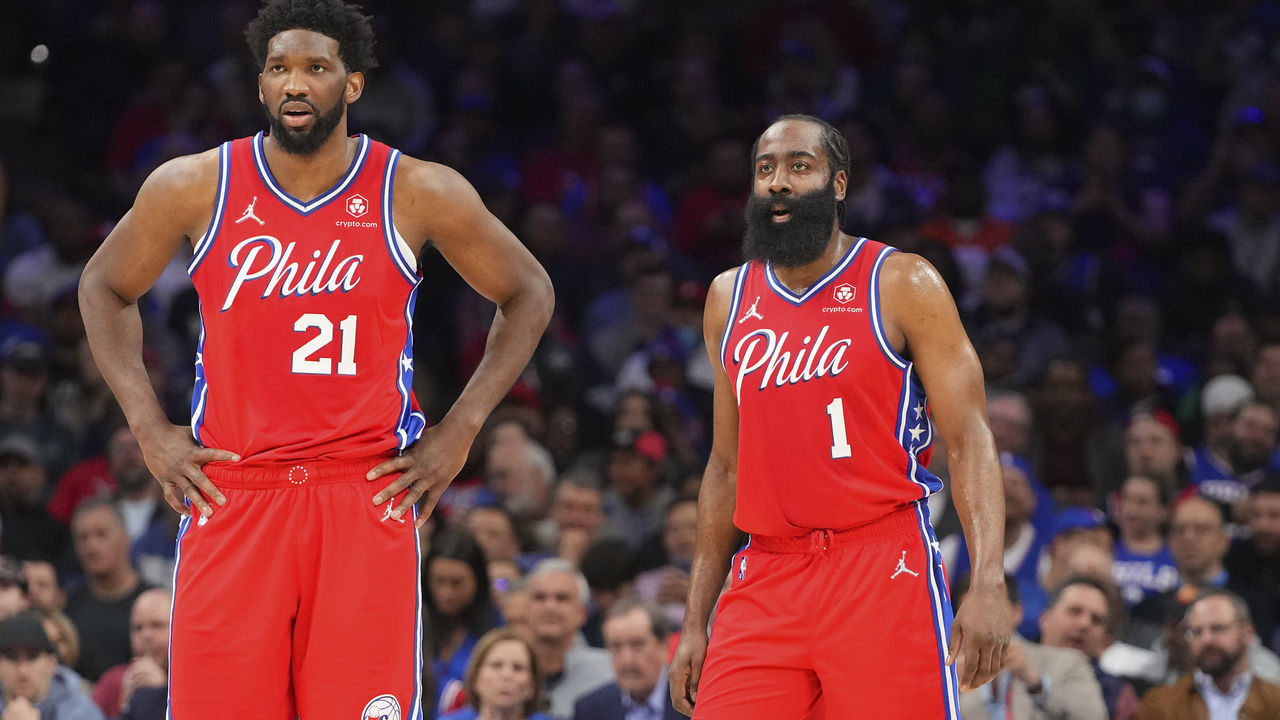 PHILADELPHIA, PA - MARCH 14: Joel Embiid #21 of the Philadelphia 76ers and James Harden #1 look on against the Denver Nuggets at the Wells Fargo Center on March 14, 2022 in Philadelphia, Pennsylvania. The Nuggets defeated the 76ers 114-110.