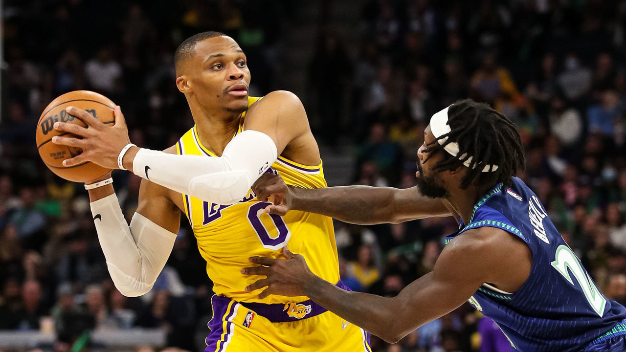 MINNEAPOLIS, MN - DECEMBER 17: Russell Westbrook #0 of the Los Angeles Lakers competes against Patrick Beverley #22 of the Minnesota Timberwolves in the third quarter of the game at Target Center on December 17, 2021 in Minneapolis, Minnesota. The Timberwolves defeated the Lakers 110-92.