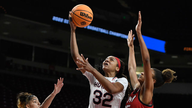 COLUMBIA, SC - MARCH 16: Krislyn Marsh #32 of the Howard Bison tries to score on Jamle Mean #35 of the University of the Incarnate Word Cardinals during the First Four round of the 2022 NCAA Women's Basketball Tournament held at Colonial Life Arena on March 16, 2022 in Columbia, South Carolina.