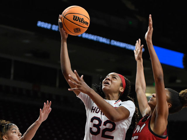 COLUMBIA, SC - MARCH 16: Krislyn Marsh #32 of the Howard Bison tries to score on Jamle Mean #35 of the University of the Incarnate Word Cardinals during the First Four round of the 2022 NCAA Women's Basketball Tournament held at Colonial Life Arena on March 16, 2022 in Columbia, South Carolina.