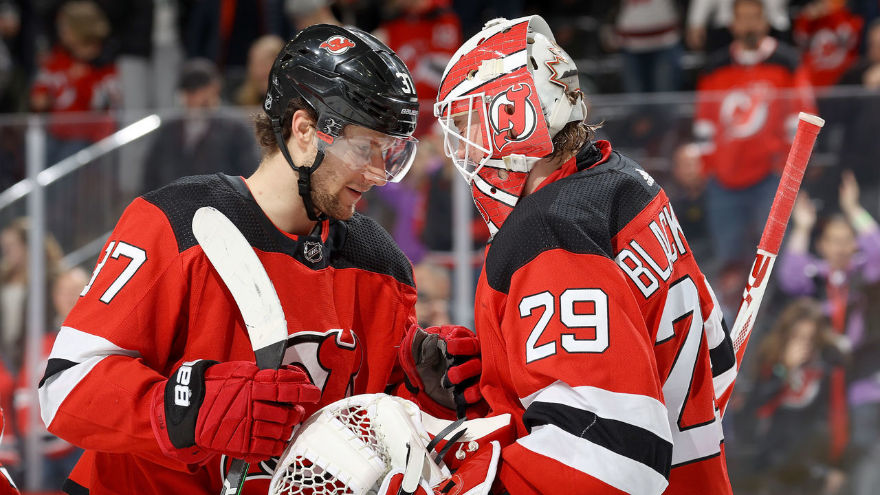 NEWARK, NEW JERSEY - FEBRUARY 08: Pavel Zacha #37 of the New Jersey Devils congratulates Mackenzie Blackwood #29 after he shut out the Los Angeles Kings at Prudential Center on February 08, 2020 in Newark, New Jersey.The New Jersey Devils defeated the Los Angeles Kings 3-0.