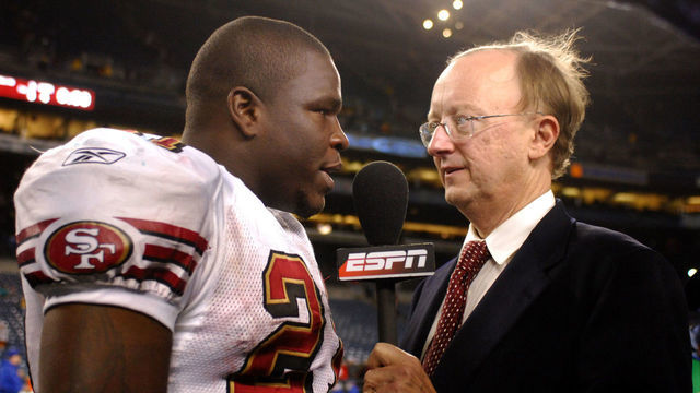 San Francisco 49ers running back Frank Gore is interviewed by John Clayton of ESPN after 24-14 victory over the Seattle Seahawks in NFL Network Thursday Night Football game at Qwest Field in Seattle, Wash. on December 14, 2006.