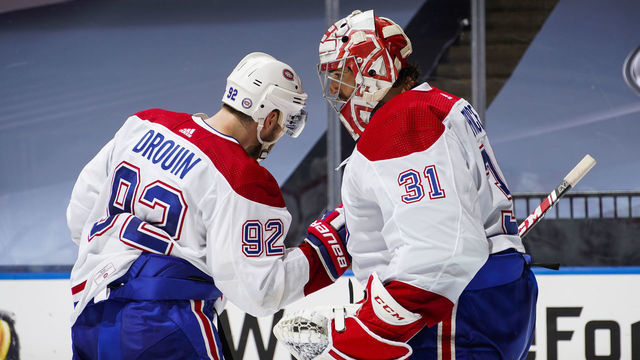 TORONTO, ONTARIO - AUGUST 14: Carey Price #31 of the Montreal Canadiens celebrates with teammate Jonathan Drouin #92 after defeating the Philadelphia Flyers in Game Two of the Eastern Conference First Round of the 2020 NHL Stanley Cup Playoff at Scotiabank Arena on August 14, 2020 in Toronto, Ontario.