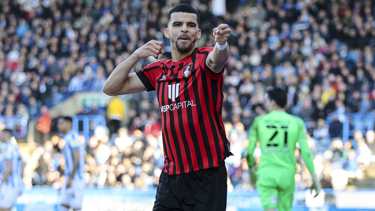 HUDDERSFIELD, ENGLAND - MARCH 19: Dominic Solanke of Bournemouth celebrates after he scores a goal to make it 3-0 during the Sky Bet Championship match between Huddersfield Town and AFC Bournemouth at Kirklees Stadium on March 19, 2022 in Huddersfield, England.