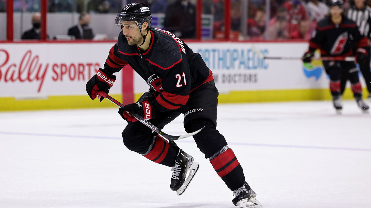 RALEIGH, NC - MARCH 6: Nino Niederreiter #21 of the Carolina Hurricanes skates for position on the ice during an NHL game against the Seattle Kraken on March 6, 2022 at PNC Arena in Raleigh, North Carolina.