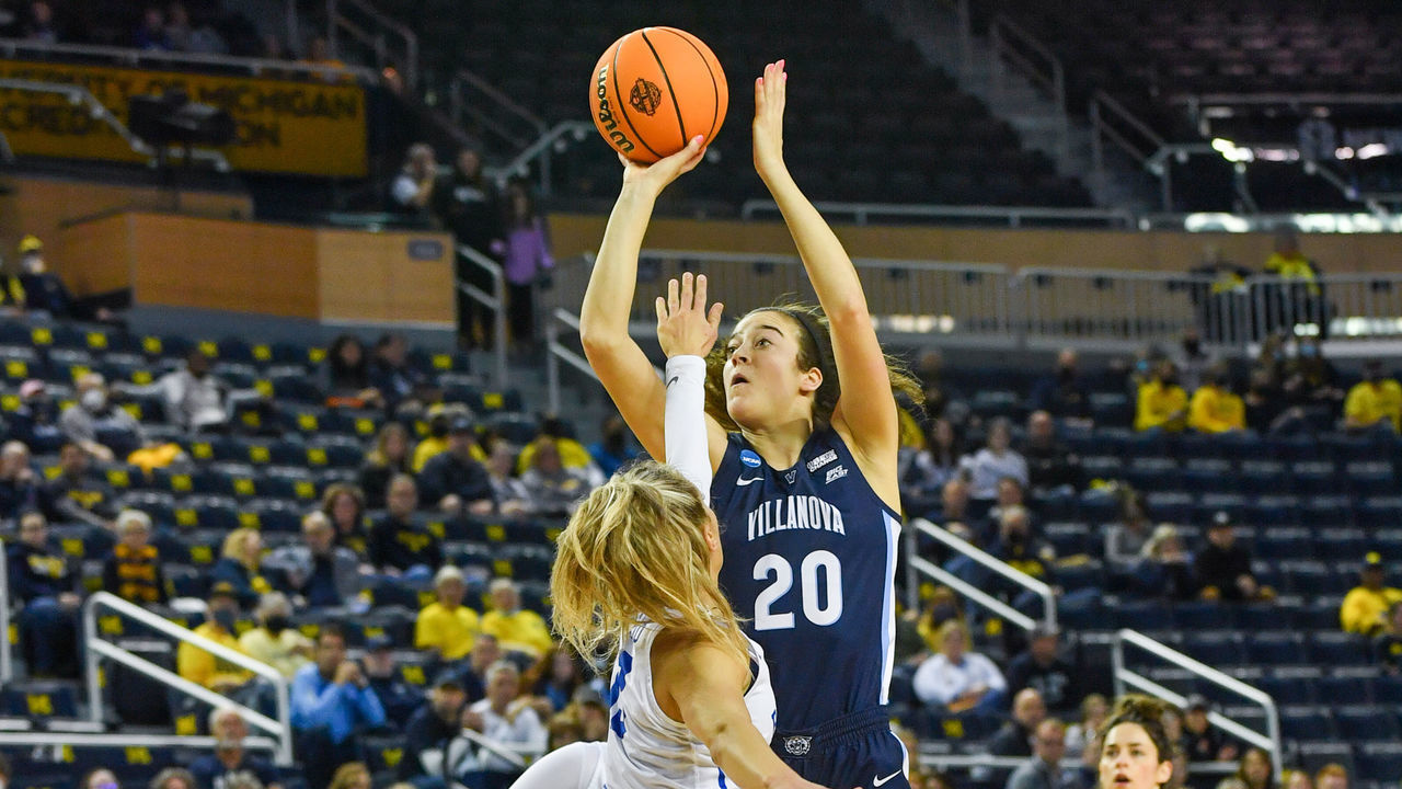 ANN ARBOR, MICHIGAN - MARCH 19: Maddy Siegrist #20 of the Villanova Wildcats attempts a shot over Paisley Harding #13 of the BYU Cougars during the first half of a Women's NCAA Basketball Tournament First Round at Crisler Arena on March 19, 2022 in Ann Arbor, Michigan.