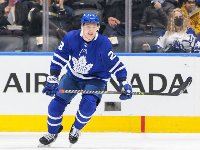 TORONTO, ON - FEBRUARY 24: Travis Dermott #23 of the Toronto Maple Leafs skates against the Minnesota Wild during the first period at the Scotiabank Arena on February 24, 2022 in Toronto, Ontario, Canada.