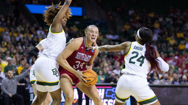 WACO, TX - MARCH 20: Hannah Sjerven #34 of the South Dakota Coyotes defends against Sarah Andrews #24 of the Baylor Bears in the second round of the 2022 NCAA Women's Basketball Tournament held at the Ferrell Center on March 20, 2022 in Waco, Texas.