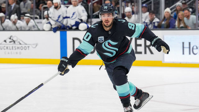 SEATTLE, WASHINGTON - MARCH 16: Marcus Johansson #90 of the Seattle Kraken skates against the Tampa Bay Lightning at Climate Pledge Arena on March 16, 2022 in Seattle, Washington.