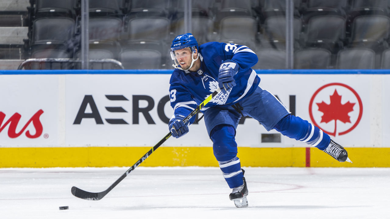 TORONTO, ON - JANUARY 1: Alex Biega #33 of the Toronto Maple Leafs skates against the Ottawa Senators during the first period at the Scotiabank Arena on January 1, 2022 in Toronto, Ontario, Canada.
