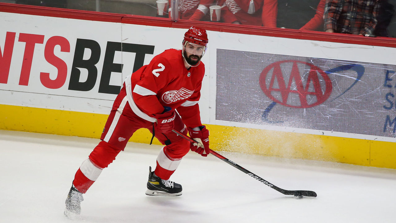 DETROIT, MI - JANUARY 31: Detroit Red Wings defenseman Nick Leddy (2) skates with the puck during the second period of a regular season NHL hockey game between the Anaheim Ducks and the Detroit Red Wings on January 31, 2022 at Little Caesars Arena in Detroit, MI.