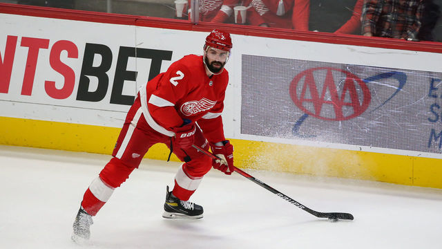 DETROIT, MI - JANUARY 31: Detroit Red Wings defenseman Nick Leddy (2) skates with the puck during the second period of a regular season NHL hockey game between the Anaheim Ducks and the Detroit Red Wings on January 31, 2022 at Little Caesars Arena in Detroit, MI.
