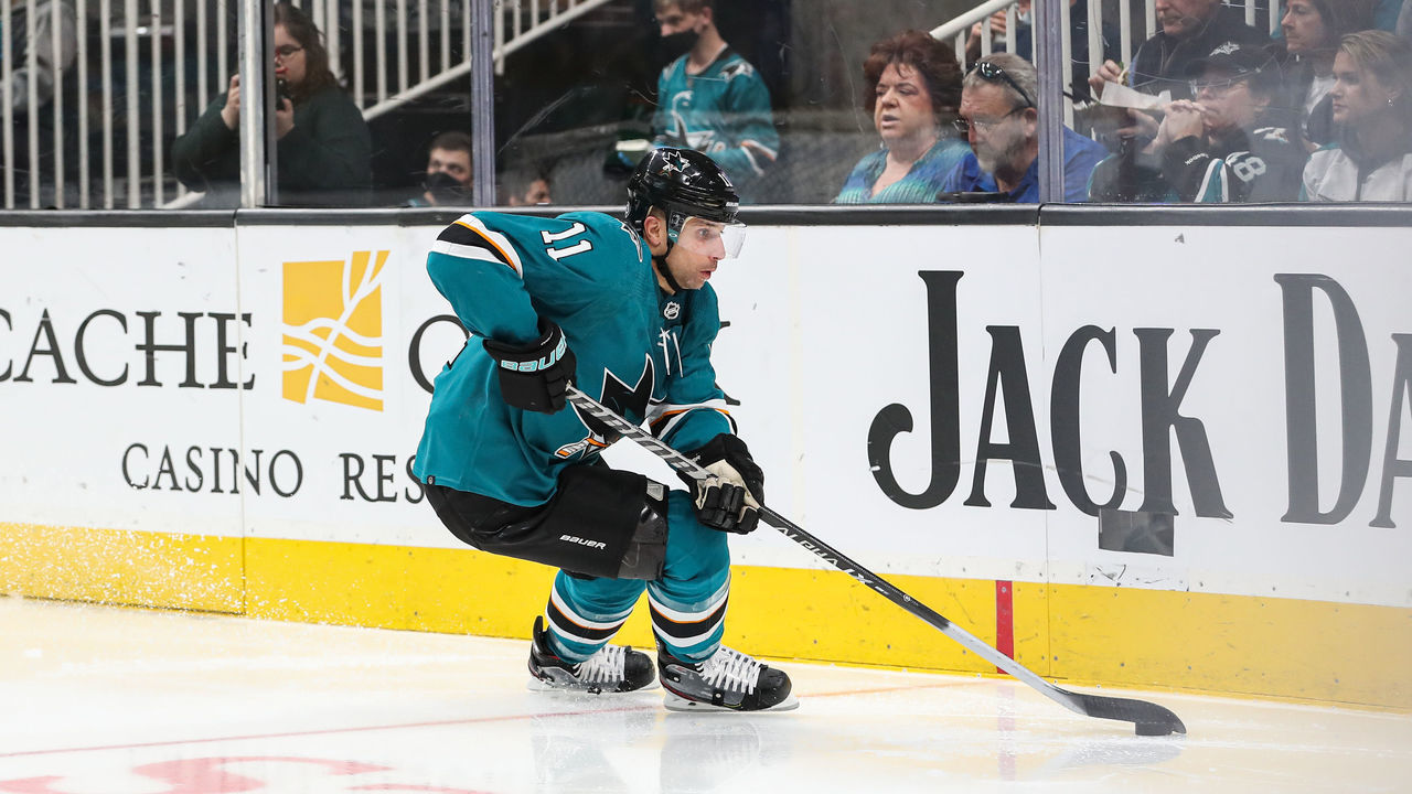 SAN JOSE, CA - MARCH 20: Andrew Cogliano #11 of the San Jose Sharks skates with puck against the Arizona Coyotes at SAP Center on March 20, 2022 in San Jose, California.